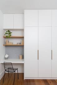 The bed is by meridiani, the wall lamp is. Tiny Simple Office Nook In White With Open Blonde Wood Shelves And Felt Tack Board Minimalist Apartment Decor Modern Apartment Decor Wardrobe Design Bedroom