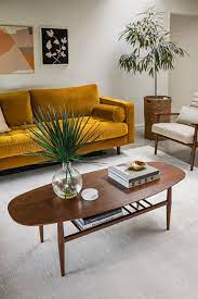 The owner of this home used it as a backdrop to highlight her art and furniture: Sven Yarrow Gold Sofa Velvet Sofa Living Room Gold Sofa Living Room Designs