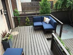 This pair of pedestals is a multifunctional option — each doubles as an end table and a stool. Philadelphia Remodel Small Outdoor Living Space Gardenista