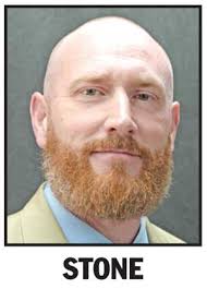 Daniel football coach Stone placed