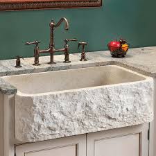 white stone farmhouse sink with