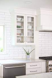 Had i been able to do white with white, i would have loved the look you chose! Look For A Cook 13 Spacious Tulsa Kitchen White Subway Tile Backsplash White Shaker Glass Wall Cabinets Kitchen Ideas