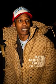 Available in 2 colors (black & grey) and 2 sizes (s/m & l/xl). A Ap Rocky Wearing The Coveted Gucci X The North Face Puffer Popsugar Fashion