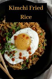 Packed With Spicy Kimchi Crispy Salt Pork Pepper Garlic And Veggies This Kimchi Fried Rice Is Super Easy Kimchi Fried Rice Asian Fusion Recipes Fried Rice