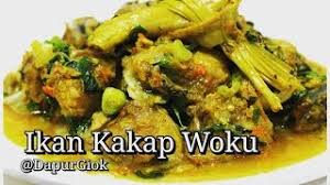 Woku adalah kuah kuning terbuat dari beragam bumbu dan bahan yang menawarkan rasa pedas, asam, gurih, segar, sekaligus harum. Ikan Kakap Woku Resep Dan Cara Membuat Ikan Kakap Woku Belanga Khas Manado Youtube