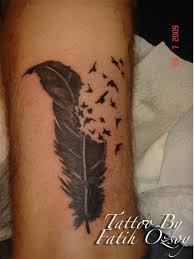 Flying bird from feather on ribs. Birds Of A Feather Tattoo Meaning