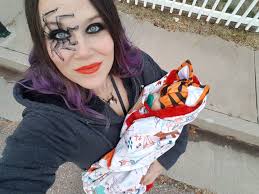 Spider attacks Japanese beetle in garden