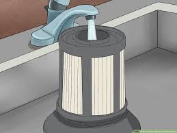 These include sprinkling baking soda or spraying diluted liquid fabric softener on the carpet before using the vacuum, or using a lightly moistened sponge mop. 3 Ways To Clean A Bissell Carpet Cleaner Wikihow