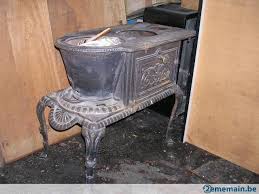 antique poele au bois tres ancien a vendre