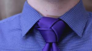 Wide end over the small end to the left. How To Tie A Tie Made Simple Half Windsor Knot Youtube