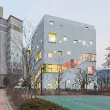 Flower Kindergarten By Jungmin Nam Features Curvy Classrooms And Colourful Corridors Architecture Collage Kindergarten Design Hospital Architecture