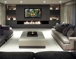 Here's what you need to know before you hang a television over a fireplace. Wnetrza Moj Pokoj Trendy Living Rooms Contemporary Living Room Home Decor