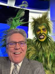 I got to meet The Grinch at work today! He's is a mean one but he was nice  enough to do a selfie with me!