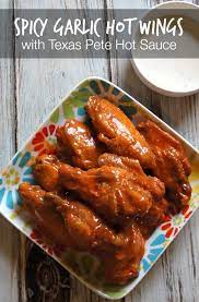 Spicy Garlic Hot Wings With Texas Pete Hot Sauce Share This Post Via Social Media And Texaspete Will Donate Hot Wing Recipe Wing Sauce Recipes Wing Recipes
