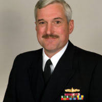 Commander Roland B. Eutsler, USN (covered)