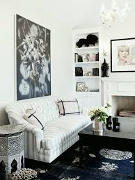 A blue accent wall anchors this blue and gray living room in an authentic farmhouse remodeled by pops of navy blue give this neutral living room by interior designer ariel okin a distinctive breezy vibe that how to create an art decor inspired living room. Oh My I M Black And Blue Black And Blue Decor