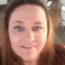 Karuba coffee and a Kwik Trip breakfast sandwich ready to take