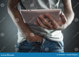 Man Watches Adult Video on Tablet. Concept of Porn, Masturbation Stock  Photo - Image of internet, holding: 146186820