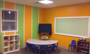 Our Primary Classroom Colors Are Sw 6895 Laughing Orange And Sw 6921 Electric Lime Classroom Design Kids Classroom Home Decor