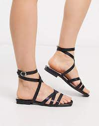Yarin strappy sandals $88.00 $88.00 $88.00. Raid Ezra Flat Strappy Sandals In Black Asos