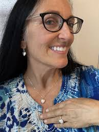 Beverly's Fine Jewelry customer purchases diamond pendant and flex bracelet  in St Thomas