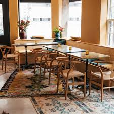 Consider investing in a dining room rug that covers a large amount of floor space and provides comfort underfoot. The Best Rugs For Your Dining Room Table Eater