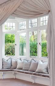 They can provide a visual statement in your room without interrupting your view. Window Treatment Idea For Bay Windows