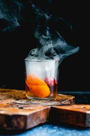 We've kicked up the old fashioned by adding smoke to make, well, the smoked old fashioned. Smoked Old Fashioned A Couple Cooks