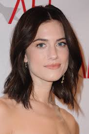 The dark brown to black base keeps your hairstyle grounded, and adding a touch of purple accents your overall look. 24 Dark Brown Hair Colors Celebrities With Dark Brown Hair