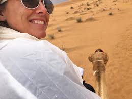 When Tara Seger began teaching history about 15 years ago at Scituate High  School, she didn't envision herself meeting with the undersecretary to the  Ministry of Education of the United Arab Emirates,