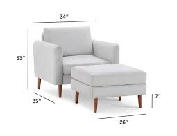 The Nomad Fabric Armchair With Ottoman Burrow