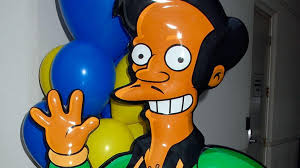 Apu returns to The Simpsons with new voice after race row — BBC
