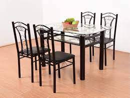 Root dining table base 60 round glass top faux bois. T2a Furniture Neoplex Glass Top Metal Base 4 Seater Dining Table Black Buy Online In United Arab Emirates At Desertcart Ae Productid 142354929