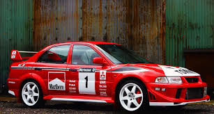 Mitsubishi Lancer Evo Vi Tommy Makinen Edition Rally Livery Stickers And After Market Wheels Mitsubishi Lancer Mitsubishi Lancer Evolution Mitsubishi Evo