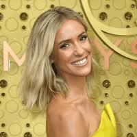 While inexplicably wearing bathing suit bottoms emblazoned with harry's name. Chelsea Handler Skis Topless On 46th Birthday Watch