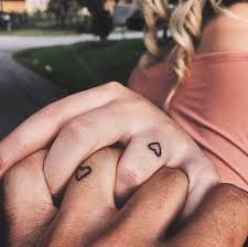 Matching Small Heart Tattoos On The Fingers Perfect Idea For A Husband And Wife Finger Tattoos For Couples Matching Couple Tattoos Couple Tattoos