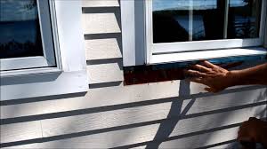 The exterior window trim is white and the interior trim brown. How To Replace Exterior Window Trim Video Youtube