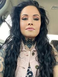 Tattoo covering self-harm scars representing life and eternal life