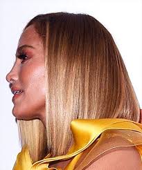 Though she always looks great, you wouldn't really call jennifer lopez as a style chameleon. Jennifer Lopez Medium Straight Blonde Bob Haircut With Blunt Cut Bangs And Dark Blonde Highlights