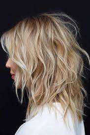 You can make two tails, if there is a mood it looks great! Trendy Medium Length Hairstyles For Thick Hair Messy Shaggy 334x500 Alldaychic