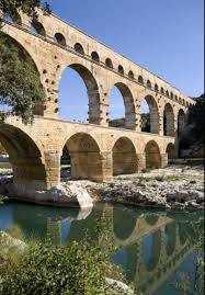The Pont Du Gard Is Part Of The Roman Aquaduct Built Of Sandstone In A First Century Bc The Fresh Wa France Travel Ancient Roman Architecture Roman Aqueduct