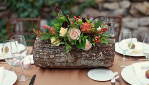 Woodland Love The Flowers In The Log Woodland Wedding Centerpieces Log Centerpieces Rustic Centerpieces