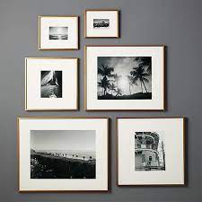 Buying custom frames online can be a challenge, we get it. Gallery Brass Frames With White Mats Cb2