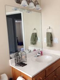 You can easily frame existing mirror with stick on frames for bathroom mirrors. Diy Stick On Mirror Frame Sawdust Sisters