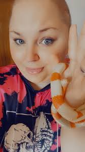 Taming a Biak Green Tree Python