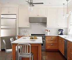 Combining Wood Base Cabinets With White Upper Cabinets Instills This Kitchen With An Aestheti Kitchen Plans Kitchen Cabinet Design Cherry Wood Kitchen Cabinets
