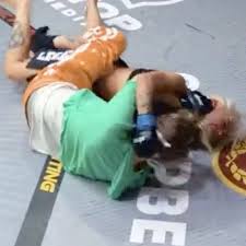 Nip slips and MMA cage invasion as porn star leaves reality TV flop with  broken nose - Daily Star