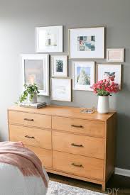 A Gray Guest Bedroom With Blush Accents The Diy Playbook Master Bedroom Wall Decor Home Decor Bedroom Decor For Women
