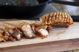 This Slow Roasted Pork Belly Becomes Tender With A Crispy Skin Recipe Pork Belly Roasted Pork Belly Recipe Pork Belly Recipes