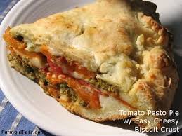 Savory Tomato Mozzarella And Basil Pesto Pie With An Easy Cheesy Biscuit Crust This Recipe Made With Biscuit Dough Is Almost G Recipes Food Cheesy Biscuit